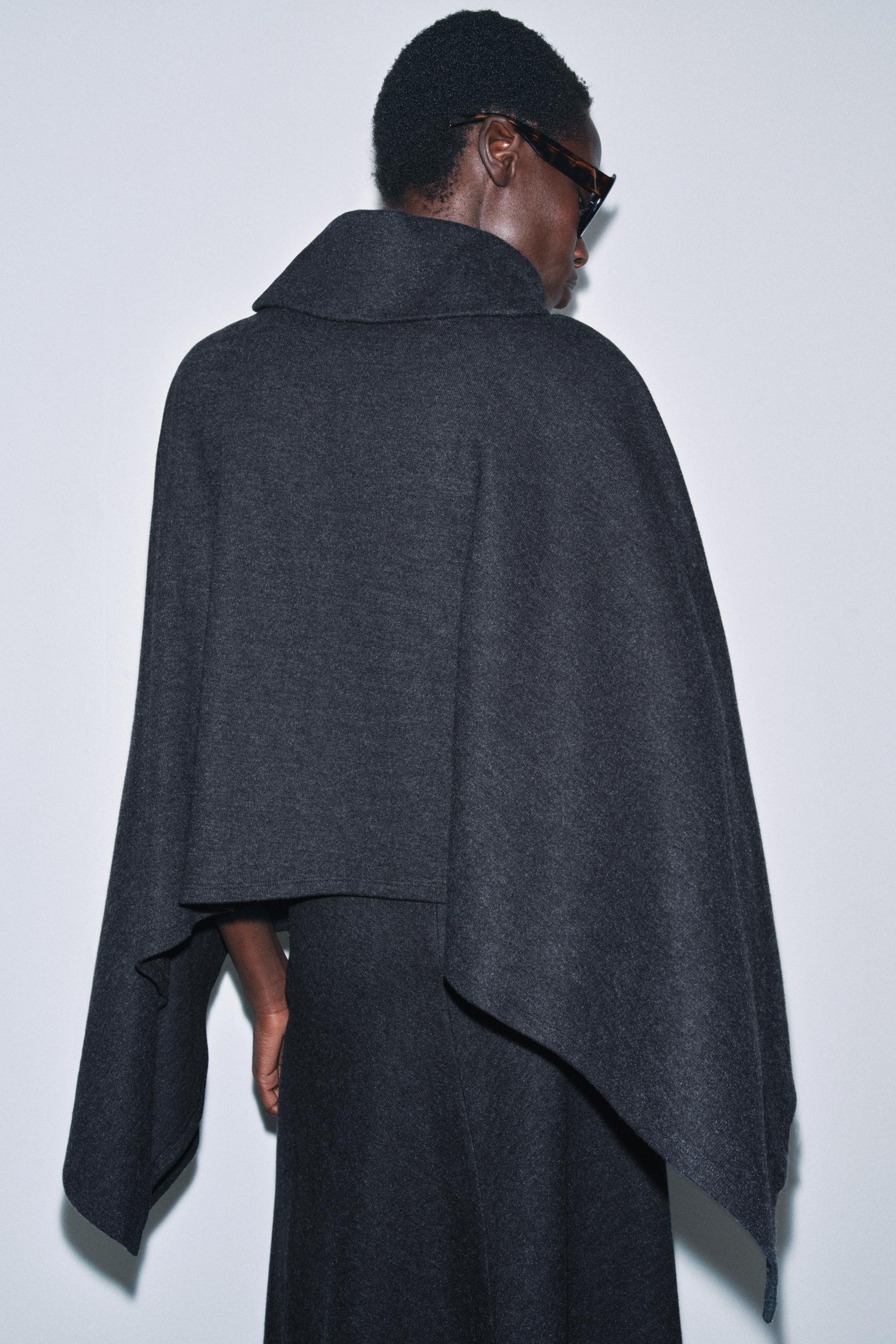 ASYMMETRIC SOFT CAPE